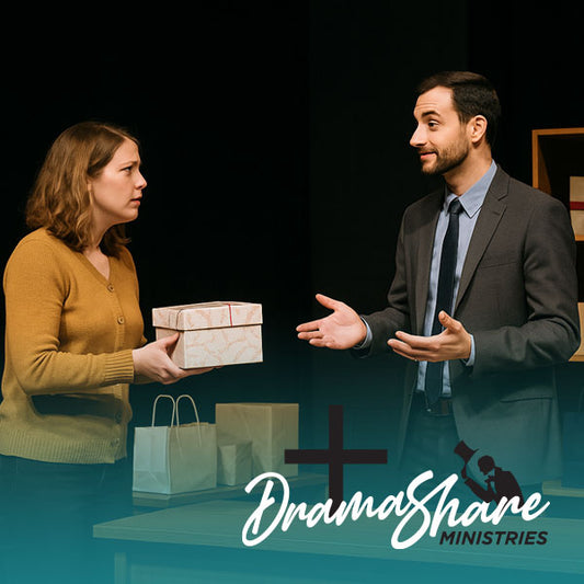 Two people on a stage with gift boxes, featuring the Drama Share Ministries logo.