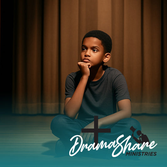Child sitting on stage