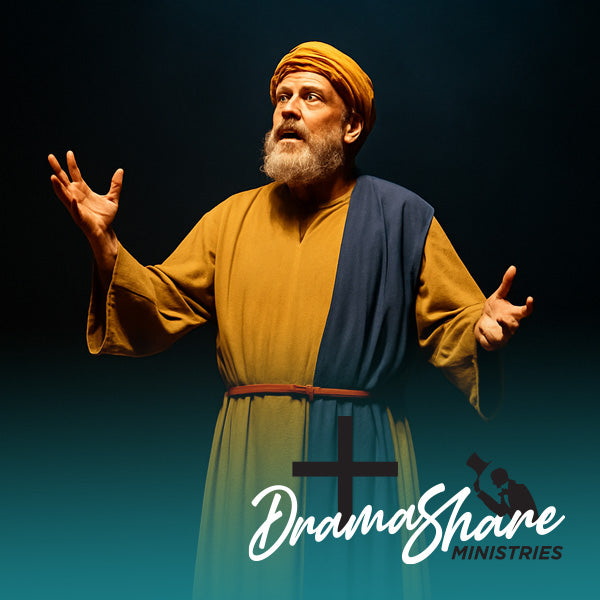 A middle-aged actor portraying Zechariah stands alone on a dark stage under a golden spotlight, dressed in biblical robes and headwrap, gesturing upward in awe and fear.