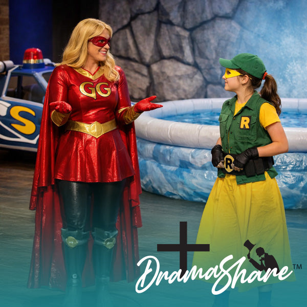 Two people in superhero costumes standing by a pool with 'DramaShake' branding.